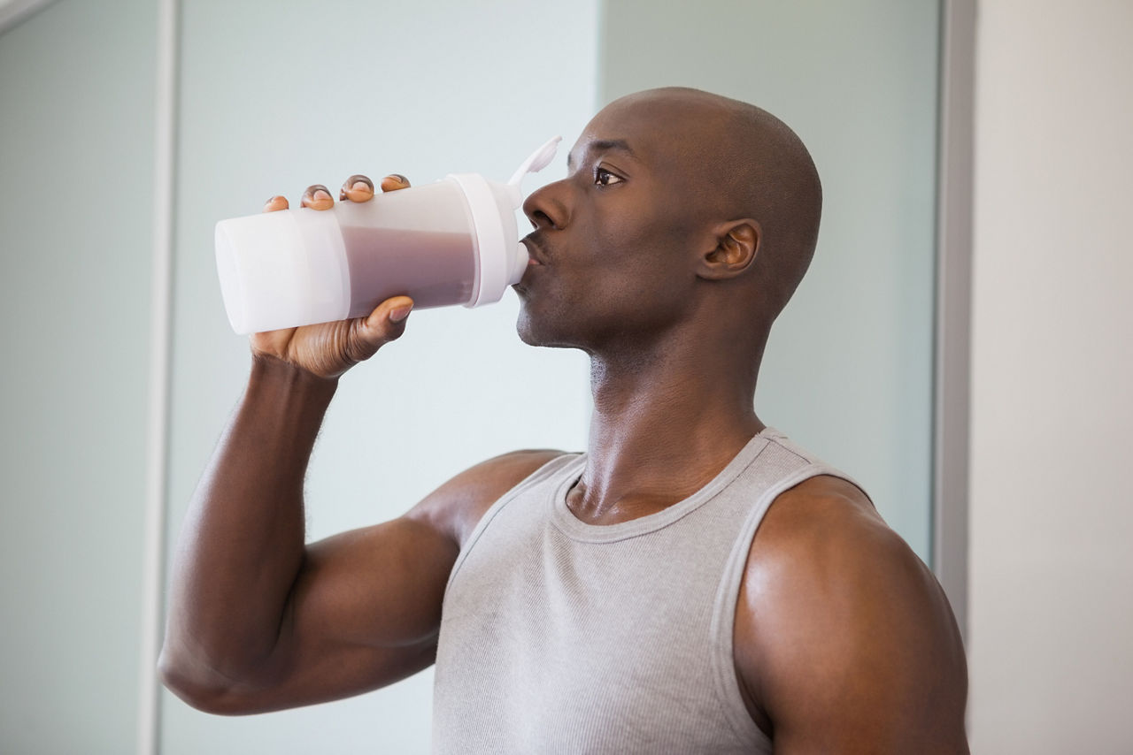 Man drinking a shake
